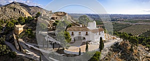 High angle panoramic view of Hermitage of La Magdalena and Old Castle ruins on top of the hill in Castello