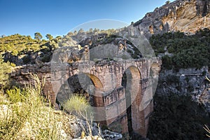 High angle shot of the beautiful bridge of Pena Cortada captured in Chelva, Valencia, Spain photo