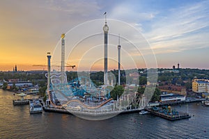 High angle shot of a beautiful cityscape near a river under the sunset sky in Stockholm, Sweden