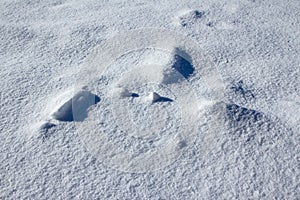 High angle shot of beautiful glowing snow textures - pureness concept