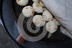 High angle shot of Chinese traditional Xiaolongbao in a basket