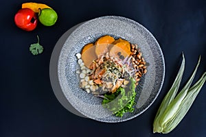 High angle shot of the delicious Peruvian ceviche dish in a beautiful plate