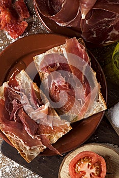 Catalan pa amb tomaquet with serrano ham photo