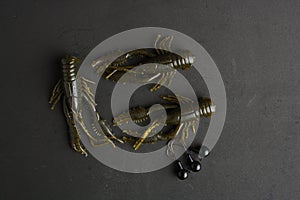 High angle shot of fishing lures isolated on a black background