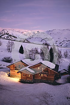 High angle shot of a homey cabin at Alpe d Huez ski resort in the French alps in France photo