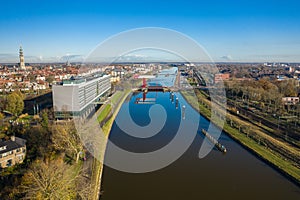 High angle shot of a lake in the middle of city buildings in Middelburg, Netherlands