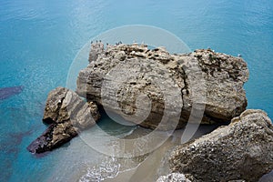 High angle shot of large rocks on the coast of Nerja, Malaga, Spain