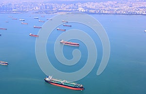 High angle shot of ocean liner, tanker and Cargo Ship in Singapore Strait. photo