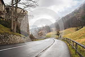 High angle shot of a road going down a hill beside the Vaduz castle in Liechtenstein
