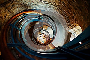 High angle shot of a spiral looking indoor stairs