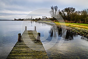 High angle shot of a wooden pier at the Veerse Meer Veere, Zealand, The Netherlands