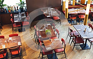 High angle of tables set in restaurant interior