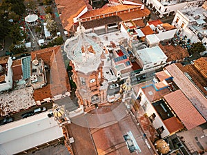High angle top top down view of our Lady of Guadalupe church in Puerto Vallarta, Mexico at sunset