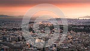 High angle view of Acropolis and Athens city in Greece at sunset from the Lycabettus Hill