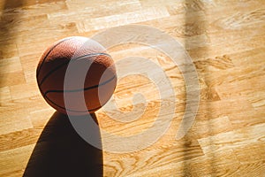 High angle view of basketball on hardwood floor