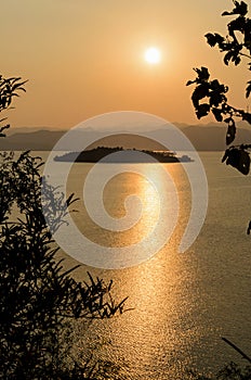 High angle view beautiful lake and island at sunset