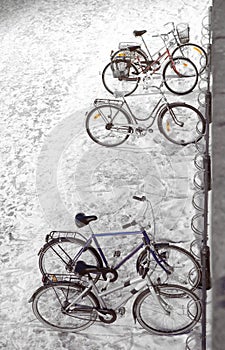 High angle view of parked bikes stand in winter