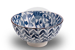 High angle view of blue pattern ceramic bowl with black edge