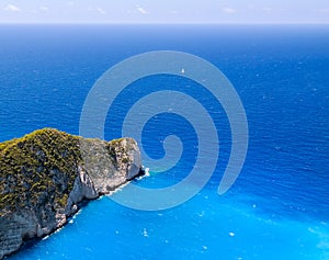 High angle view of blue sea and rocks, at Navagio Beach.