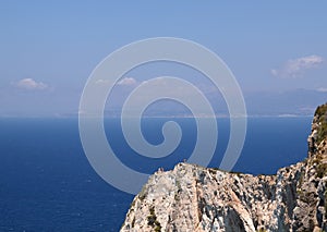 High angle view of blue sea and rocks, at Navagio Beach.