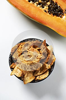 Slices of dried papaya served as appetizer or snack