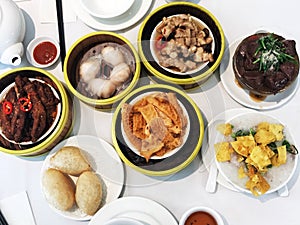 High angle view of Chinese yumcha dimsum set in bamboo container. Breakfast, arranged.