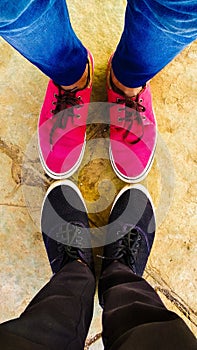 High angle view of couples shoes photo