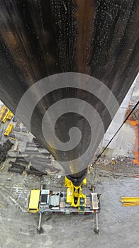 High angle view of a crane truck with the boom in foreground at a construction site