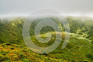 High-angle view of the crater of the Caldeira volcano located on the island of Fayal, Azores photo