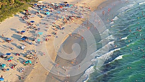 High angle view of crowded Nokomis beach in Sarasota County, USA. Many people enjoying vacations time swimming in ocean