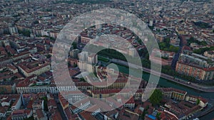 High angle view of Darsena lake, Water surface among buildings in urban borough. Aerial view of city at dusk. Milano