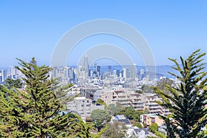 High angle view of dense housing structures and skyscraper buildings in San Francisco, CA