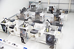 High Angle View Of Engineering Workshop With CNC Machines