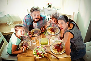 High angle view of family having meal together