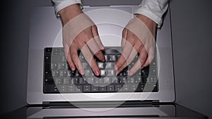 High-angle view of female blogger hands busy typing on computer to writing content or article to web blogs for internet