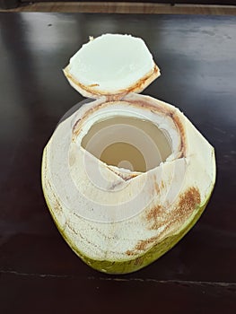 high angle view of fresh young coconut drink