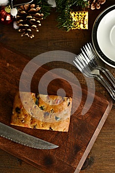 High angle view fruit cake on a cutting board