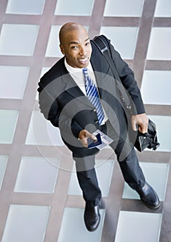 High angle view of happy African businessman