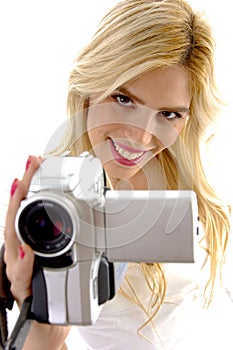 High angle view of happy woman with handy cam