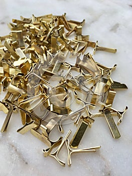 High angle view of locking clips for envelopes