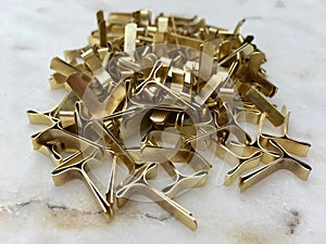 High angle view of locking clips for envelopes