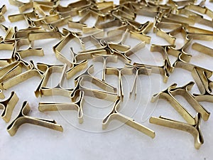 High angle view of locking clips for envelopes
