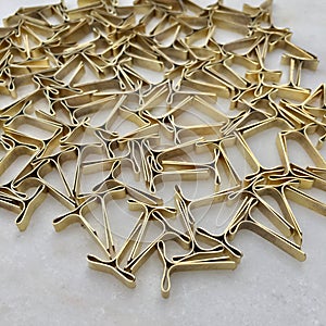 High angle view of locking clips for envelopes