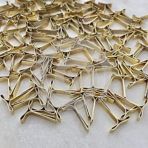 High angle view of locking clips for envelopes