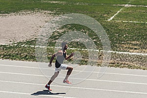 high angle view of male sprinter on running track at sport