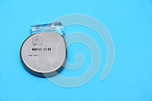 High angle view of a mini implantable cardioverter defibrillator (ICD) device photo