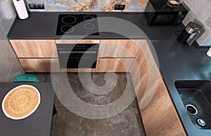 High angle view of a modern compact fitted kitchen
