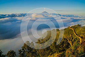 High Angle View of Mount Bromo Covered with Clouds Against Sky
