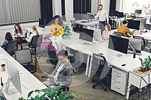 High angle view of multiethnic group of businesspeople working together