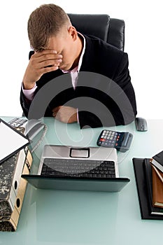 High angle view of a nervous businessman